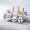 Navelring van zilver met moissaniet steen, goud, zilver en rose gold | D-Carats.