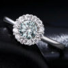 Beautifully unique green moissanite halo ring in sterling silver | D-Carats.