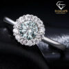 Halo ring featuring a 0.5ct round-cut green moissanite centerstone with a classic white halo setting in high-polish S925 sterling silver | D-Carats.