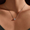 Necklace on neck heart jewelry set in sterling silver with moissanite diamond | D-Carats.