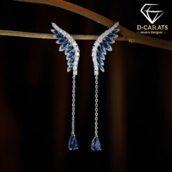 Stunning sterling silver climber earrings with blue stone | D-Carats.