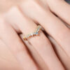 18k yellow gold-plated crown ring is on the ring finger with moissanite diamond | D-Carats.
