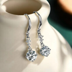 Lightweight and easy to wear fish hook earrings in sterling silver with moissanite diamond | D-Carats.