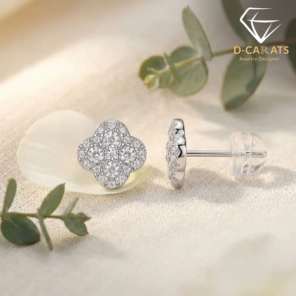 Clover earrings in platinum-plated 925 silver with moissanite 7 Close-up side view of platinum-plated silver earrings clover with sparkling moissanite stones on a white flower petal