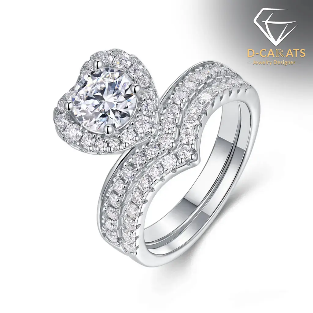 Moissanite Heart Halo Engagement Ring Set 16 Close-up of a silver heart shaped engagement ring set featuring a sparkling moissanite center stone with a diamond halo