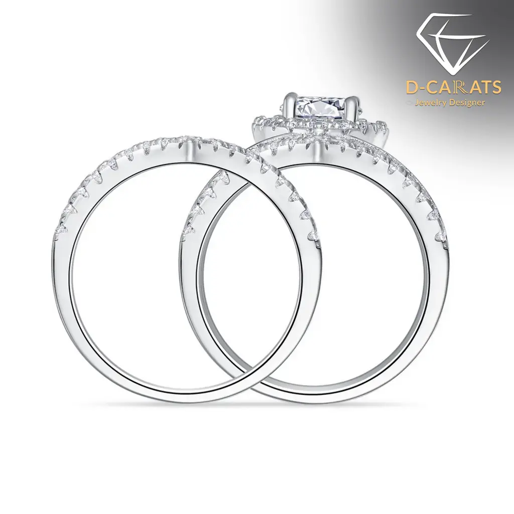 Moissanite Heart Halo Engagement Ring Set 17 Side view of a silver heart shaped engagement ring set featuring shimmering pavé diamonds along the polished bands