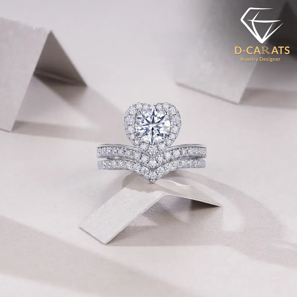 Moissanite Heart Halo Engagement Ring Set 14 Close-up of a sparkling heart shaped engagement ring set with a diamond halo and matching v-shaped wedding band