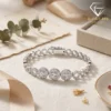 Close-up of a platinum S925 silver triple halo bracelet with sparkling moissanite stones resting on a textured beige surface