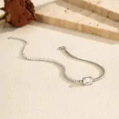 Premium sterling silver tennis bracelet for women showcasing an adjustable fine chain and a 1.00-carat emerald-cut moissanite gem | D-Carats.