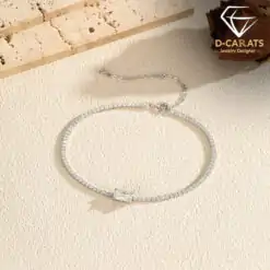S925 sterling silver chain bracelet with a 1.00ct D-color VVS1-clarity emerald-cut moissanite and cubic zirconia accent stones | D-Carats.