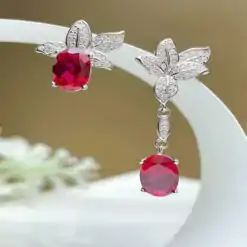 Unique asymmetrical ruby earrings in sterling silver | D-Carats.