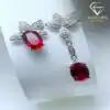 High quality asymmetrical ruby earrings in sterling silver | D-Carats.
