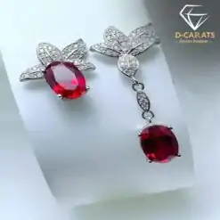 High quality asymmetrical ruby earrings in sterling silver | D-Carats.