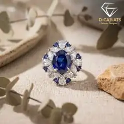 Oval lab-created blue sapphire cocktail ring with a halo of zircons and sapphires | D-Carats