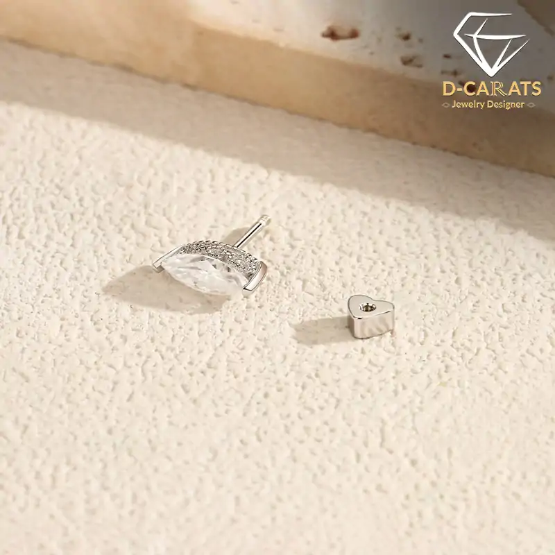 Marquise moissanite cartilage stud earring in S925 sterling silver with milgrain bezel setting and heart screw-back closure | D-Carats.