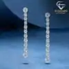 Round cut flat back sterling silver moissanite dangle earrings | D-carats.