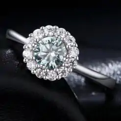 Beautifully unique green moissanite halo ring in sterling silver | D-Carats.