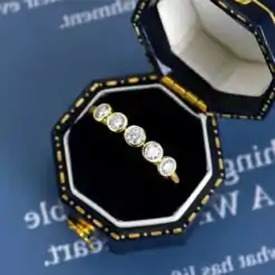 Beautiful half eternity sterling silver bezel moissanite ring | D-Carats.
