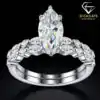 Marquise engagement ring set in sterling silver with a stacked half-eternity wedding band | D-Carats.