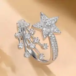 Affordable star ring with moissanite diamond in sterling silver.