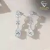 Sparkling moissanite 3 stones drop earrings in sterling silver | D-Carats.
