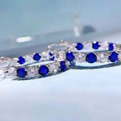 Beautiful sterling silver sapphire omega back hoop earrings | D-Carats.