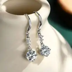 Lightweight and easy to wear fish hook earrings in sterling silver with moissanite diamond | D-Carats.