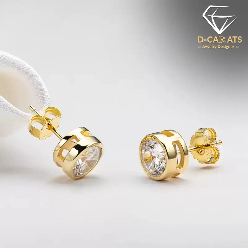 Runde Diamant-Ohrstecker. 3 Ohrstecker aus Silber mit Moissanit in vergoldeter Fassung | D-Carats.