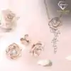 Rose-design moissanite pendant necklace and earrings set in sterling silver | D-Carats.