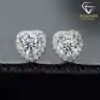 Expensive-looking heart shape moissanite halo stud earrings in sterling silver | D-Carats.