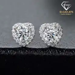 Expensive-looking heart shape moissanite halo stud earrings in sterling silver | D-Carats.