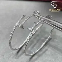 Nail design sterling silver moissanite hoop earrings | D-Carats.