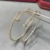Rose gold nail design sterling silver moissanite hoop earrings | D-Carats.