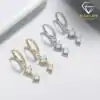 Huggie earrings <br> silver. 1 Elegant sterling silver moissanite huggie drop earrings | D-Carats.