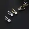 Eye-catching sterling silver moissanite huggie drop earrings | D-Carats.