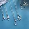 Personalized sterling silver moissanite initial pendant necklace | D-Carats.