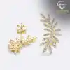 Boucles d'oreilles grimpantes en forme de feuille en moissanite plaqué or jaune | D-Carats.