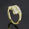 Anillo de plata con moissanita en racimo de corte redondo. 18 Anillo abierto de plata de primera calidad con moissanita y diamante | D-Carats.