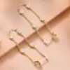 Pendientes de hilo de moissanita de plata de ley chapada en oro amarillo | D-Carats.