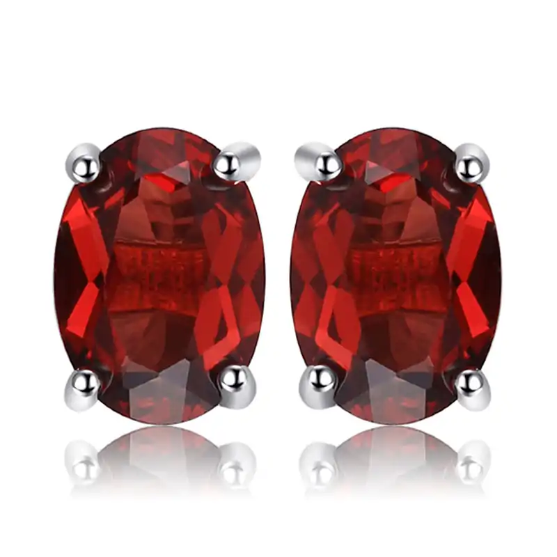 Pendientes de botón de plata con granate natural en forma ovalada. 8 Pendientes de botón asequibles con piedra natural de granate rojo en forma ovalada en plata | D-Carats.