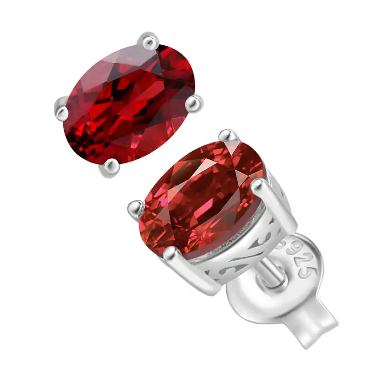 Pendientes de botón de plata con granate natural en forma ovalada. 7 Pendientes de botón para mujer con granate natural talla oval en plata de ley | D-Carats.