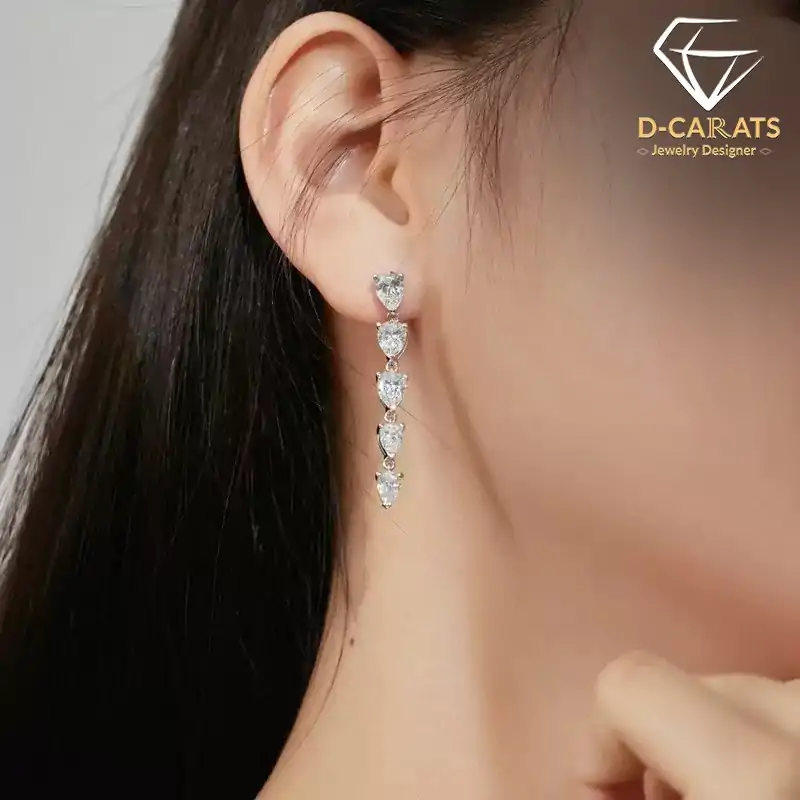 Sterling silver pear cut white sapphire dangle earrings | D-carats.
