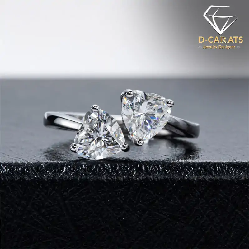 Heart shaped <br> engagement ring. 3 Romantic sterling silver two heart moissanite stones engagement ring | D-Carats.