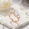 Marquise engagement ring <br> rose gold. 2 Modern marquise cut moissanite engagement ring in polished 18k rose gold sterling silver | D-Carats.