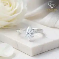 Unique marquise cut engagemet ring with sparkling moissanite in sterling silver | D-Carats.