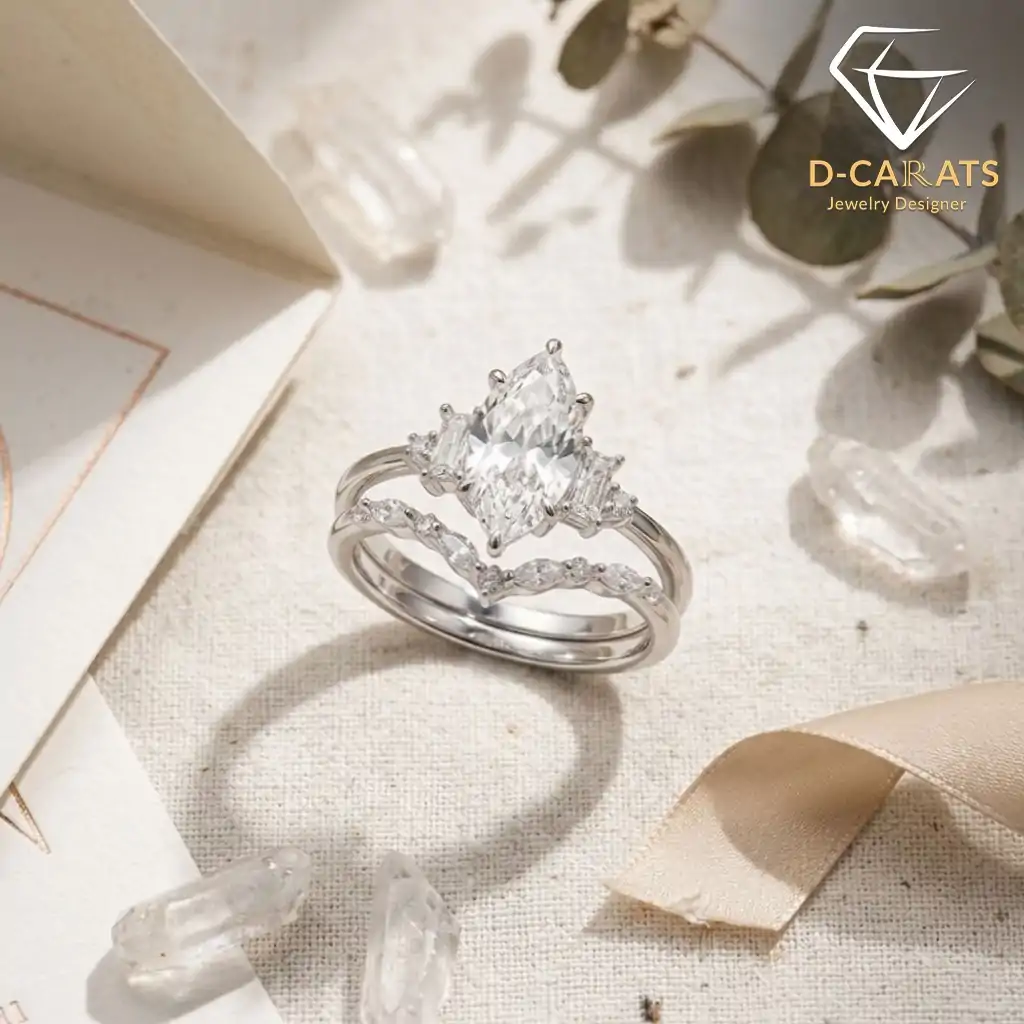 Marquise Moissanite Bridal Ring Set 7 Silver marquise moissanite bridal ring set with side baguettes and a curved band resting on a textured linen surface