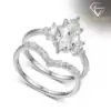 Marquise Moissanite Bridal Ring Set 27 Silver marquise moissanite bridal ring set featuring a curved wedding band with petite sparkling accent diamonds