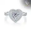 Front view of a polished silver heart ring double halo set with sparkling moissanite stones and a paved band