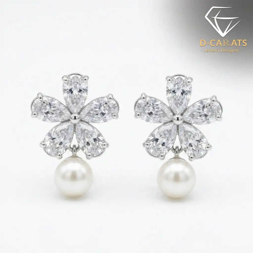 Pendientes colgantes de perla y plata con flor de circón 11 Plano detalle de pétalos de flor de circón brillante sobre elegantes pendientes colgantes de perla plateada con un suave resplandor luminoso